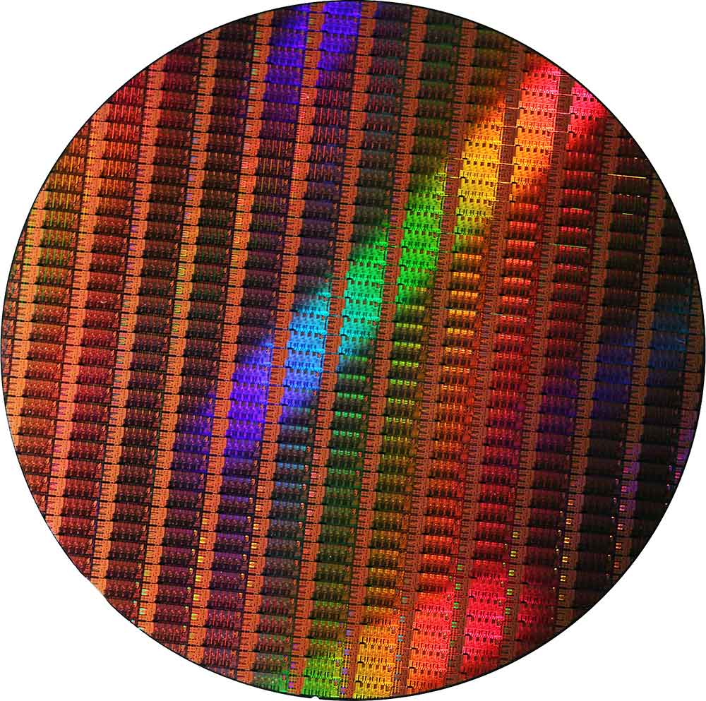 A 300mm silicon wafer comprising of hundreds of Intel 4th gen quad core dies. The die are subsequently cut and packaged as chips Intel 4th Gen Haswell CPU Die Wafer