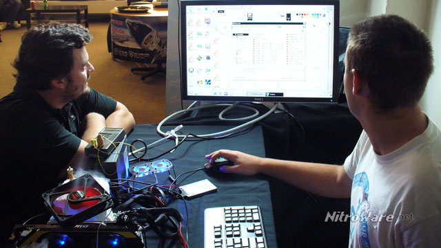 Dino S, Gigabyte AU Technical Manager and Pro Overclocker guides an enthusiast to save a record of his ~6GHz 3770K overclock during an overclocking event in Sydney, Australia Intel LN2 overclocking Core i7